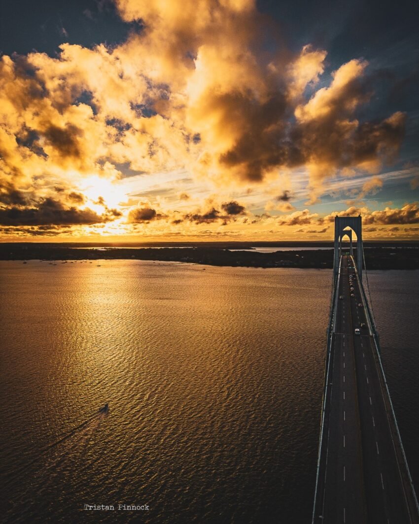 Sunset Through The Clouds Over The Newport Bridge